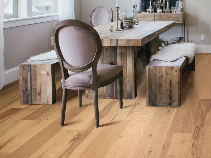 Dining room with hardwood flooring from Wholesale Flooring and Blinds in Casper, WY