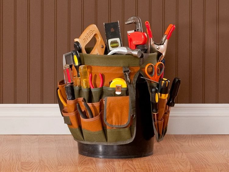 Tool bag on hardwood floor - Flooring supplies and installations from Wholesale Flooring and Blinds in Casper, WY